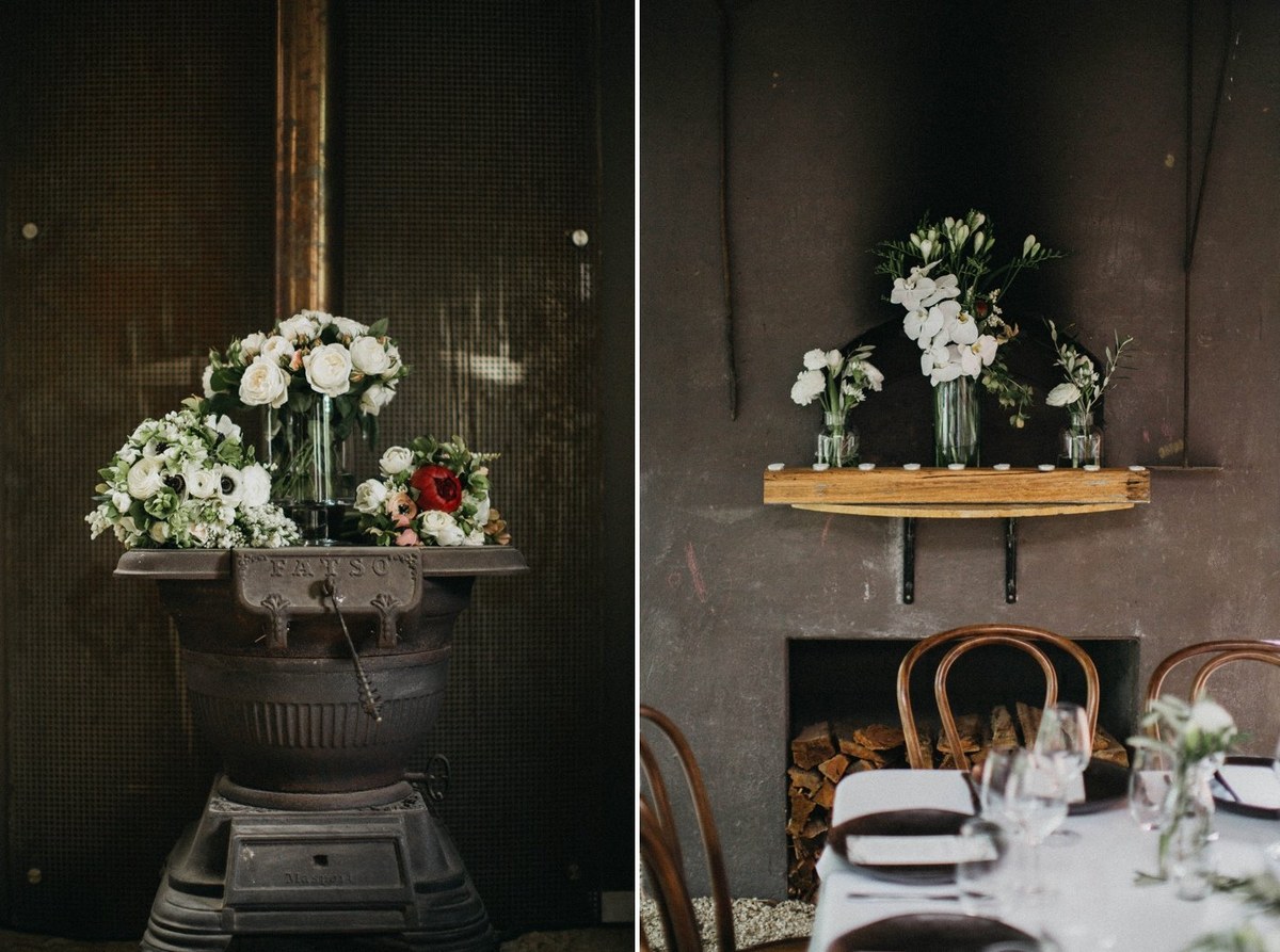 Flowers and candles decorate the reception table. Photograph by documentary wedding photographer Joshua Mikhaiel.