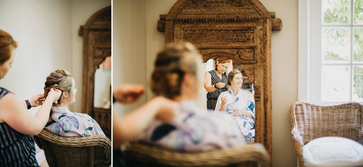 The bride and her attendants gather in the sitting room during preparations. Photograph by documentary wedding photographer Joshua Mikhaiel.