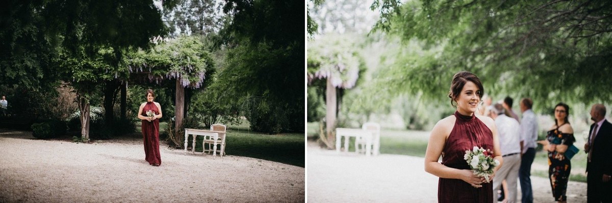 A garden arbor and ceremony table stand beneath the old tree. Photograph by documentary wedding photographer Joshua Mikhaiel.
